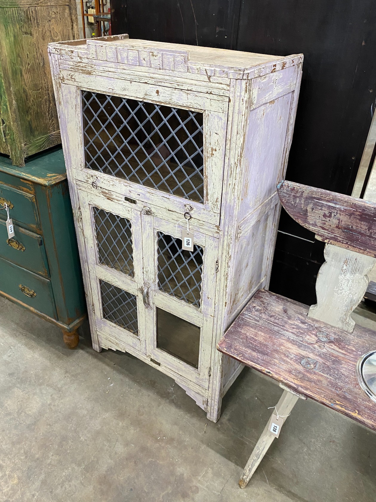 A provincial painted wood side cabinet with leaded glazed doors, width 64cm, depth 36cm, height 127cm